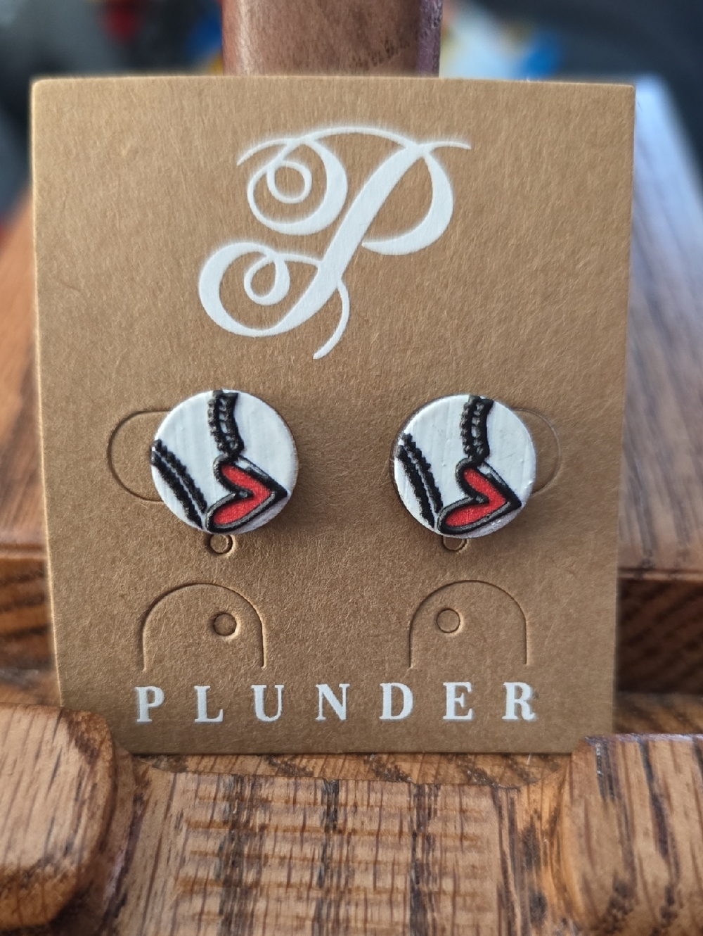 Plunder White Round Stud Earrings with Red Heart Detail